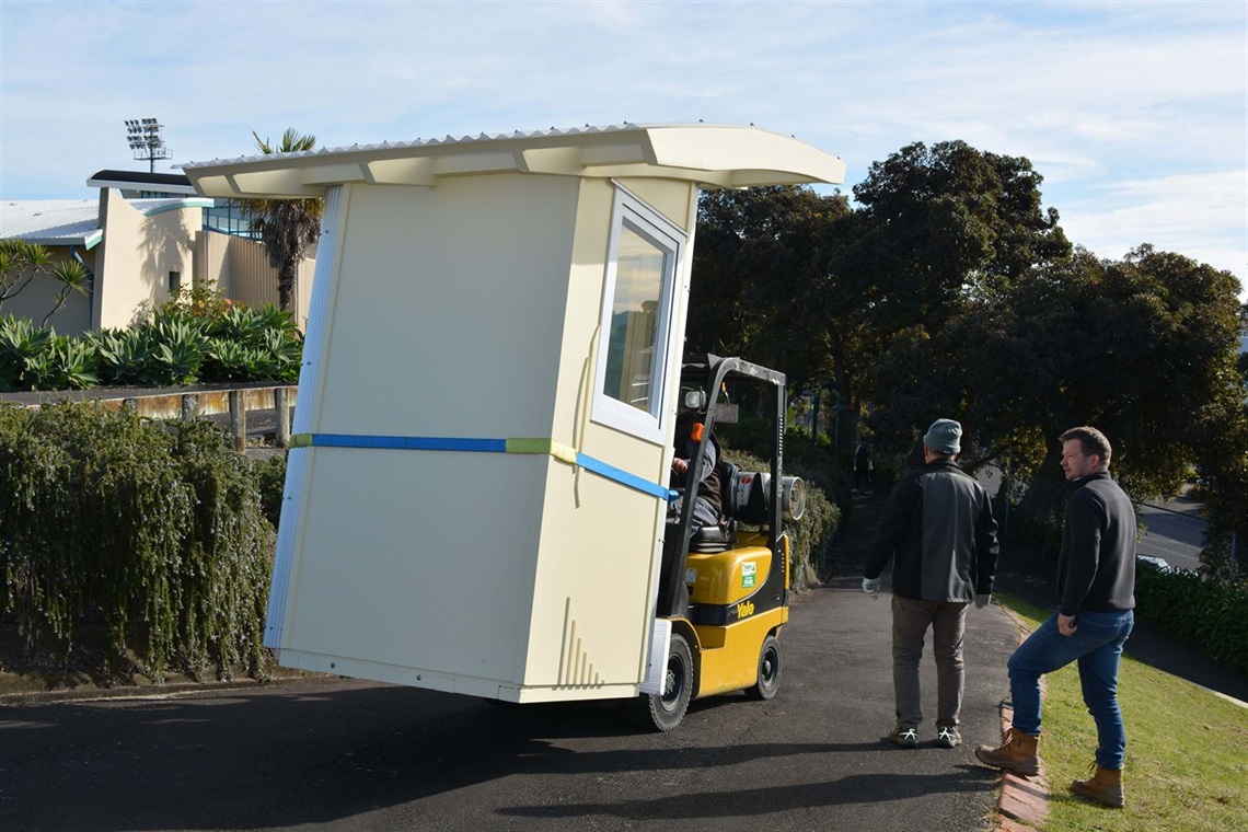 The new Cooks Gardens ticket booth being forklifted into place