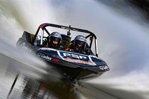 Image of jet boat going fast in the water