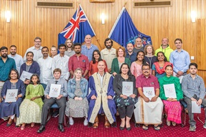 Image of new citizens with Mayor Andrew at the April 2023 citizenship ceremony