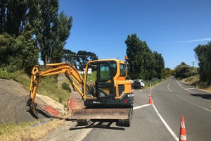 Heavy machinery on Airport Road 
