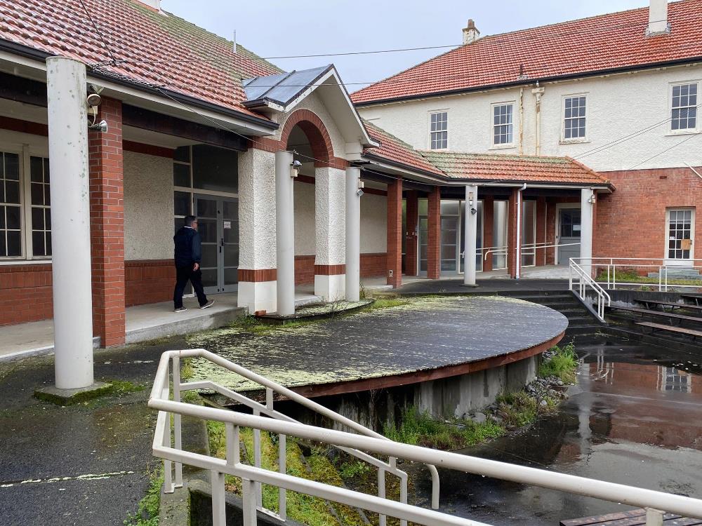 The newer administration building on the left