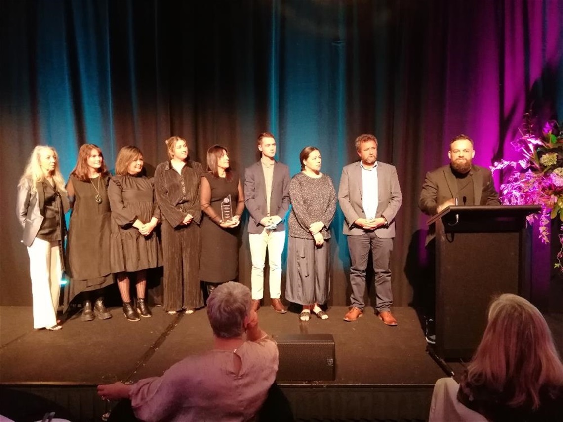 Project Director Hayden Turoa accepts the Best Practice Collaboration Award on behalf of Te Puwaha 