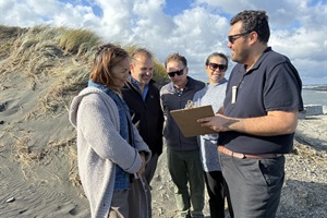 Steering group members meet with the designers on site