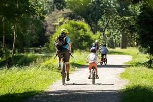 Family biking in Kowhai Park