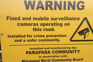 Signage for a rural security camera
