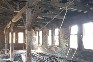 The fire damaged Thain's building