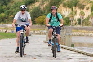 Cyclists near the Whanganui River